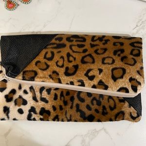 Animal print clutch with faux leather